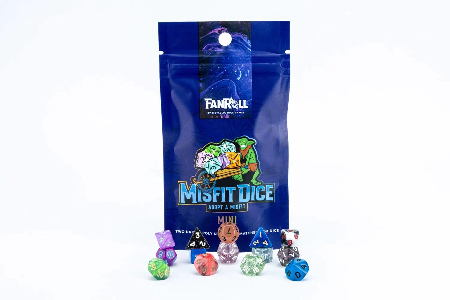 Two full sets of Mystery Misfit Mini polyhedral dice from THE MIGHTY HOBBY SHOP displayed on a fan roll.