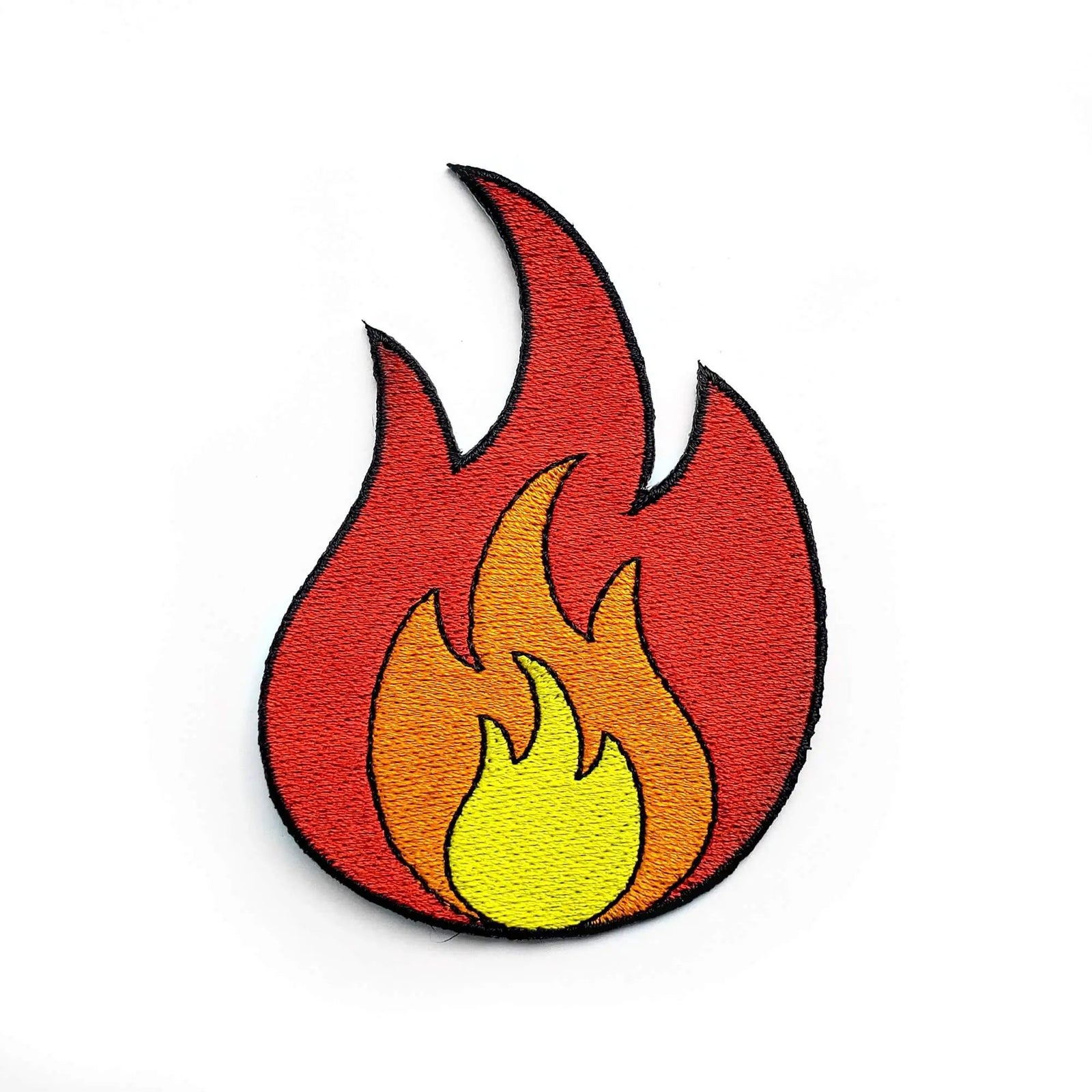 Kolorspun Fire Patch featuring a vibrant flame design, sewn fabric patch for clothing or accessories.