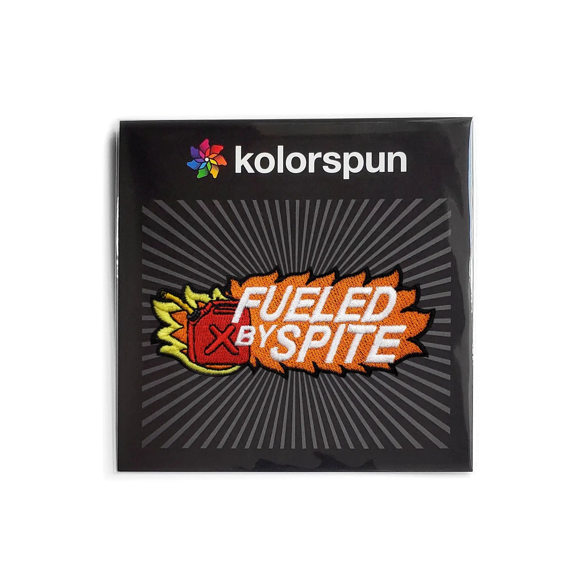 Kolorspun Fueled By Spite patch attached to a backing card, featuring bold design and vibrant colors for clothing or accessories.