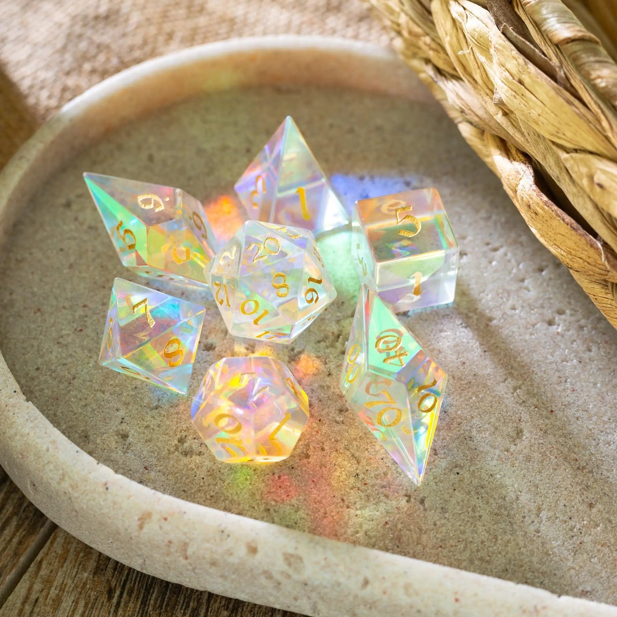 Set of gemstone dichroic glass Elven cut DND dice from Runic Dice, featuring vibrant, shimmering colors and intricate design details.