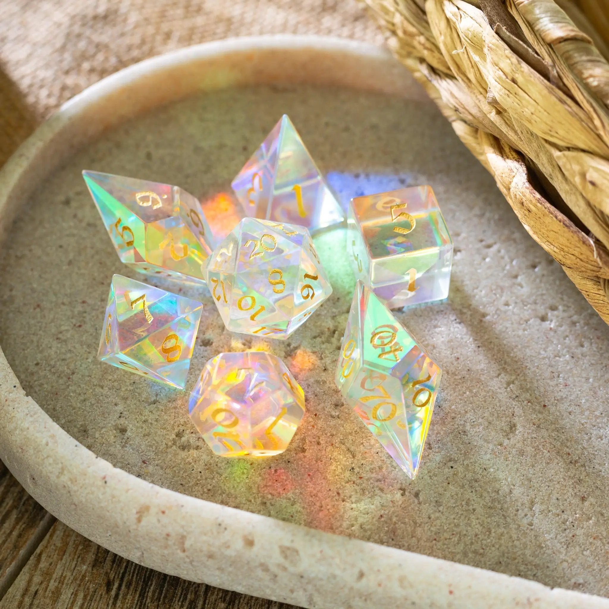 Set of gemstone dichroic glass Elven cut DND dice from Runic Dice, featuring vibrant, shimmering colors and intricate design details.