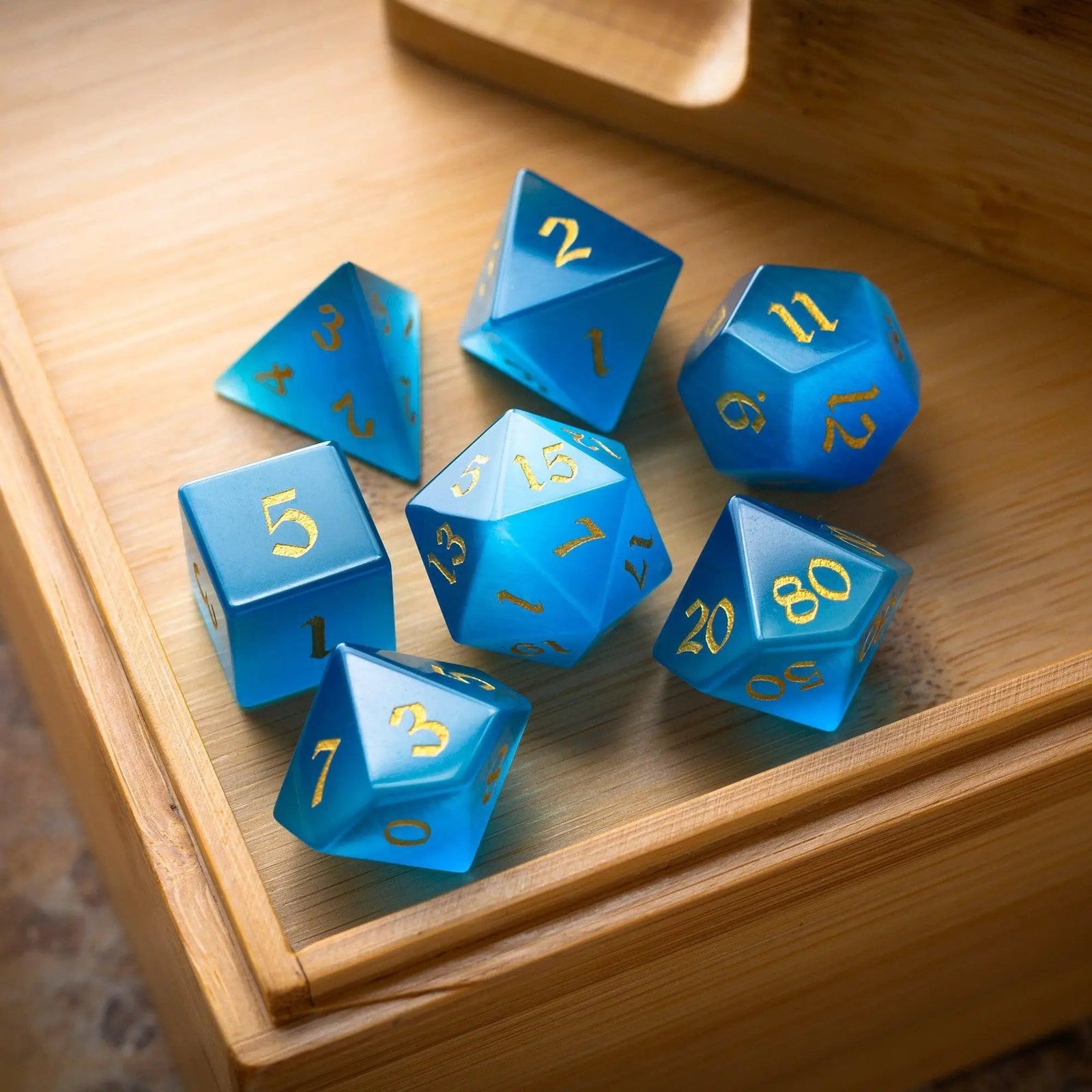Gemstone Light Blue Cats Eye Stone Hand Carved DND Dice Set by Runic Dice