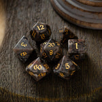 Hand-carved Yooperlite gemstone DND dice set by Runic Dice, featuring vibrant, polished gemstone dice for tabletop gaming.