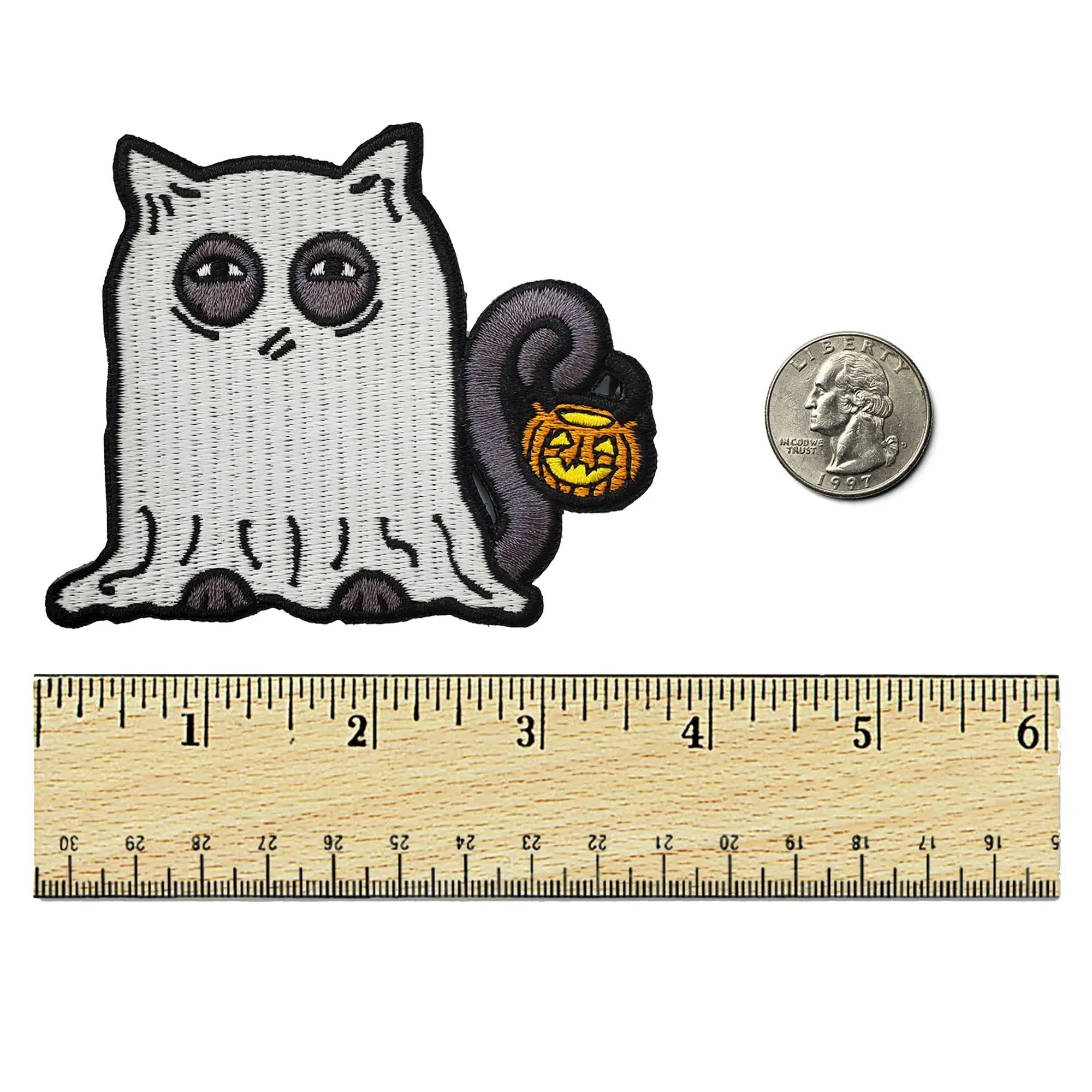 Glow-in-the-dark ghost cat patch by Kolorspun featuring a spooky feline design on a ruler background.