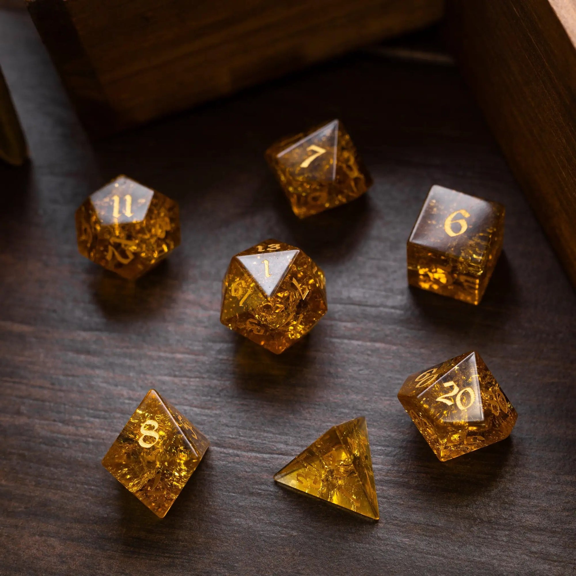 Gold honey lightning cracked glass gemstone dice set from Runic Dice with intricate crackled design for D&D gaming.