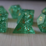 Green lightning cracked glass gemstone DND dice set by Runic Dice, featuring vibrant green and crackled glass design.