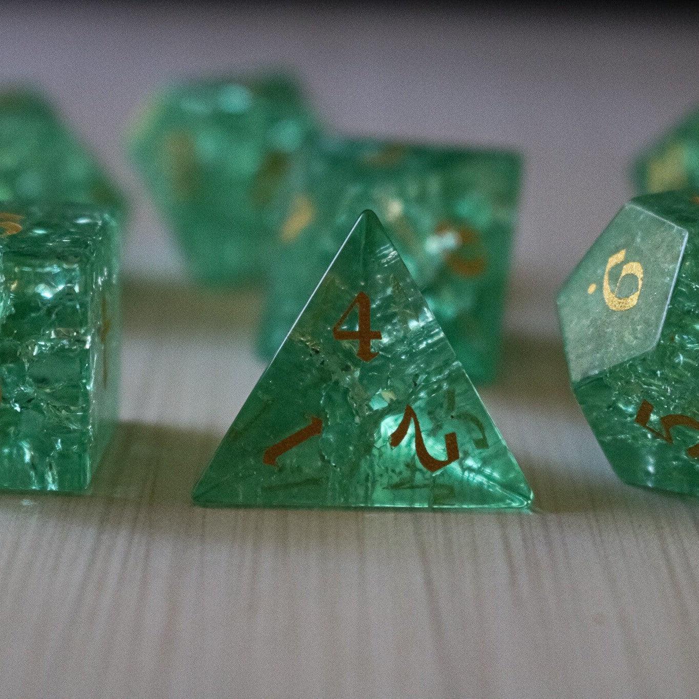 Green lightning cracked glass gemstone DND dice set by Runic Dice, featuring vibrant green and crackled glass design.
