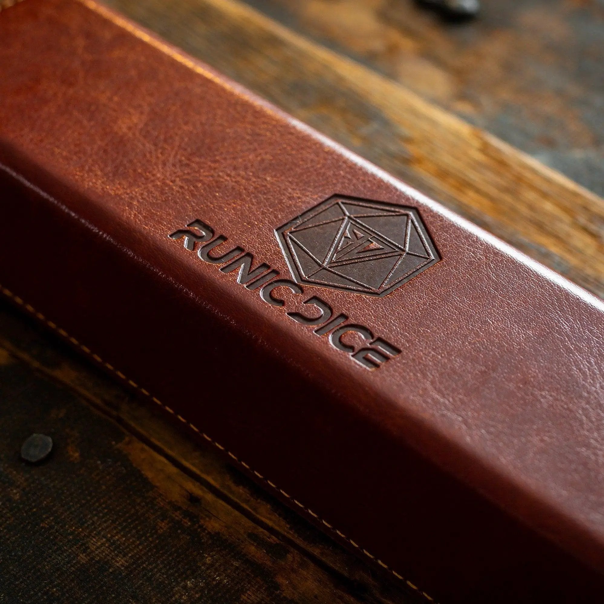 Red zircon gemstone DND dice set by Runic Dice featuring health potion-themed glass dice for tabletop gaming.