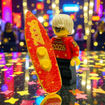 B3 Customs surfing into 2026 New Year's minifig with surfboard and festive attire on a white background
