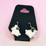 Bunny earrings by B3 Customs featuring cute, detailed bunny designs hanging from silver hooks.