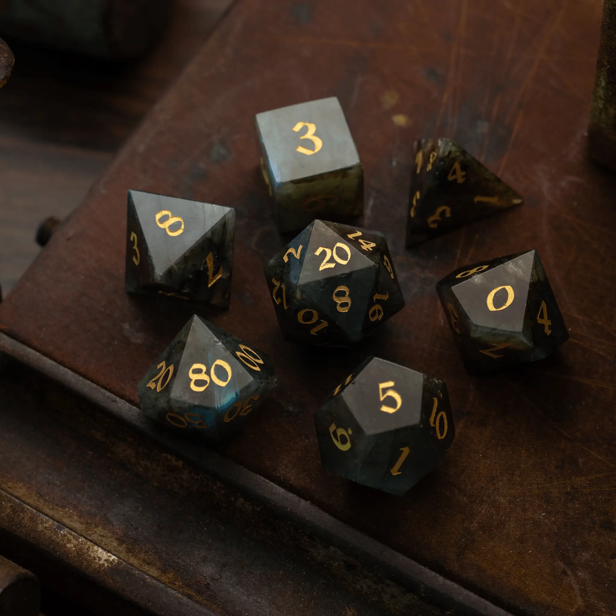 Labradorite gemstone DND dice set by Runic Dice featuring multicolored, polished gemstone dice for tabletop gaming.