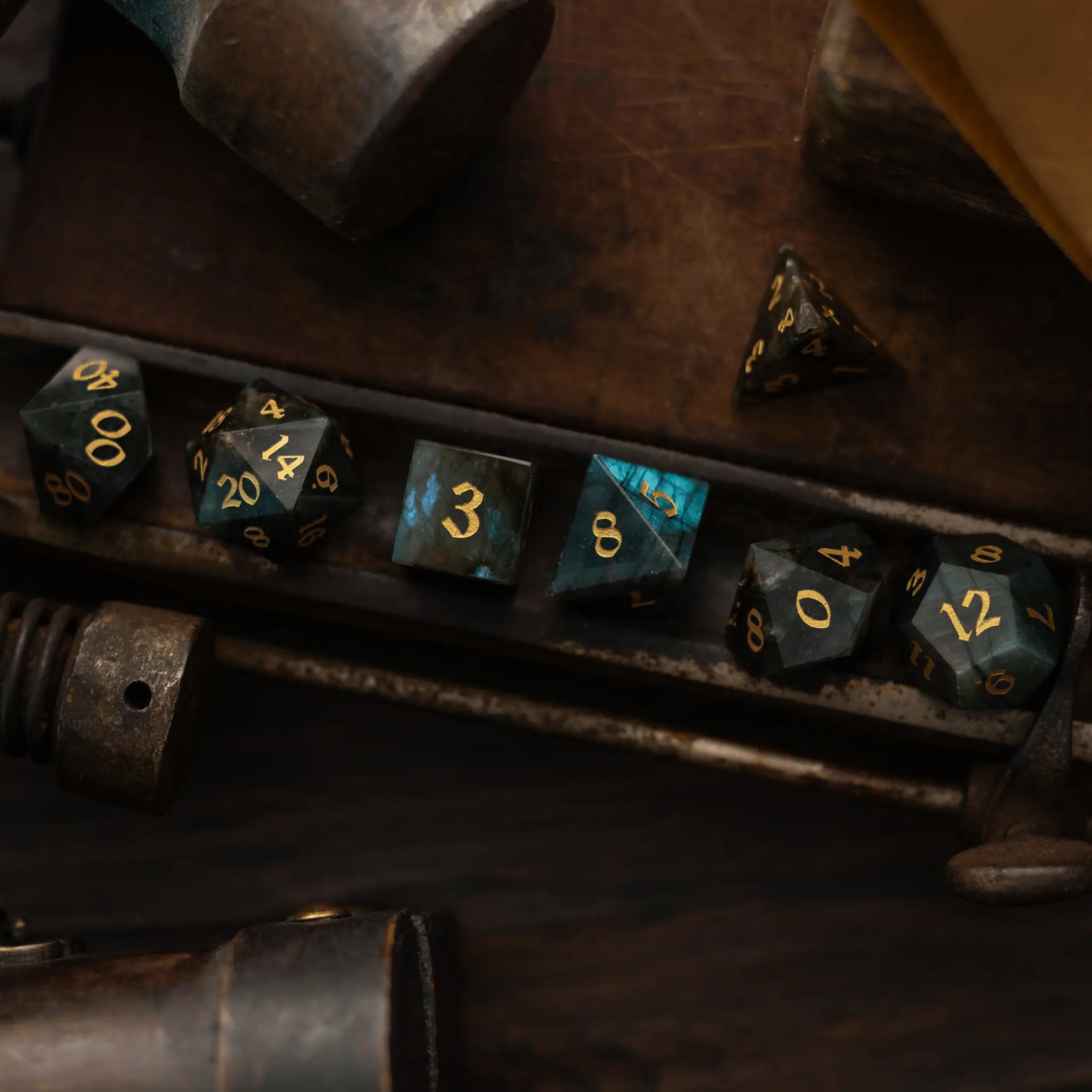 Labradorite gemstone DND dice set from Runic Dice featuring polished, multi-colored gemstone dice for tabletop gaming.