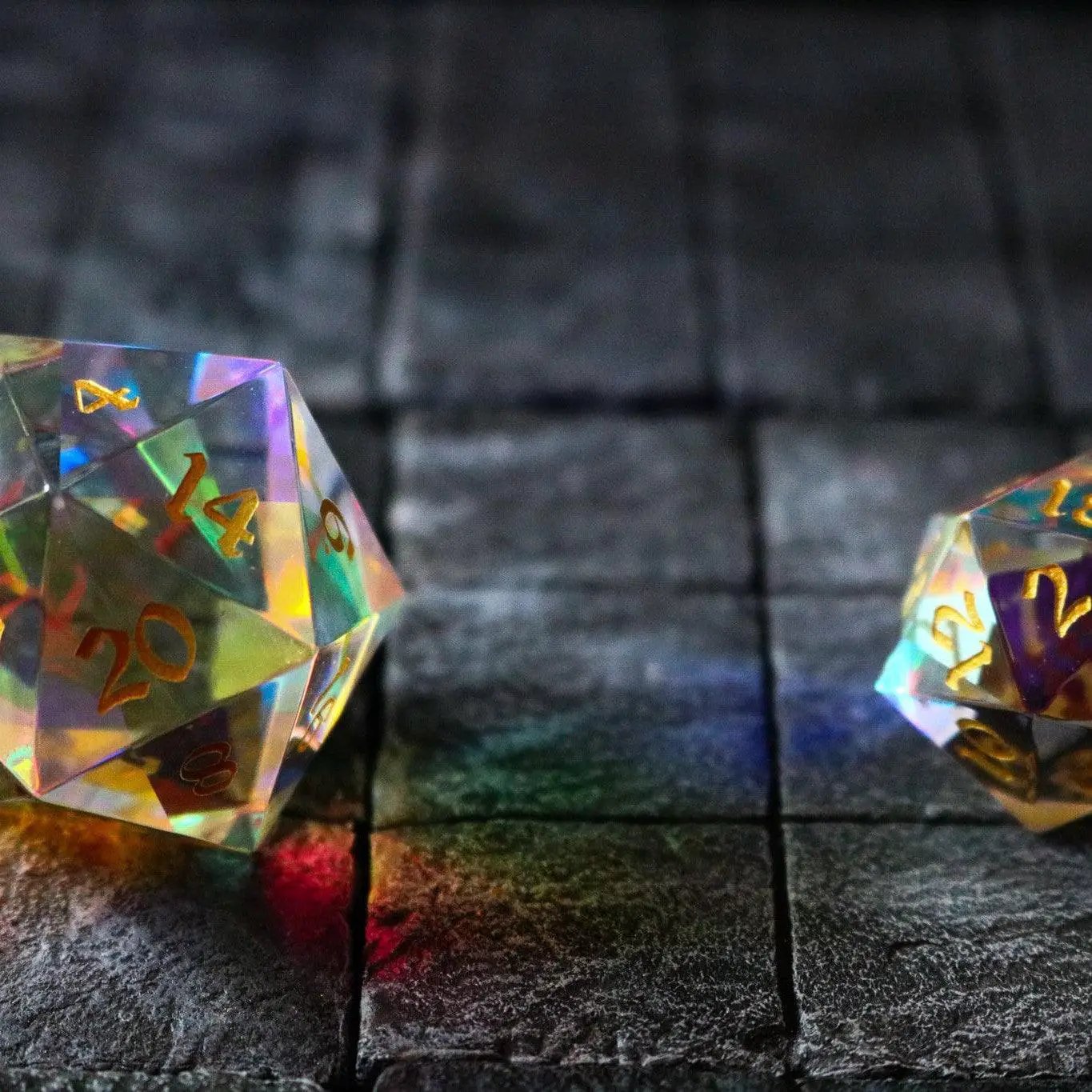 Large dragon egg-shaped dichroic glass D20 gemstone polyhedral dice by Runic Dice showing vibrant colors and intricate facets.