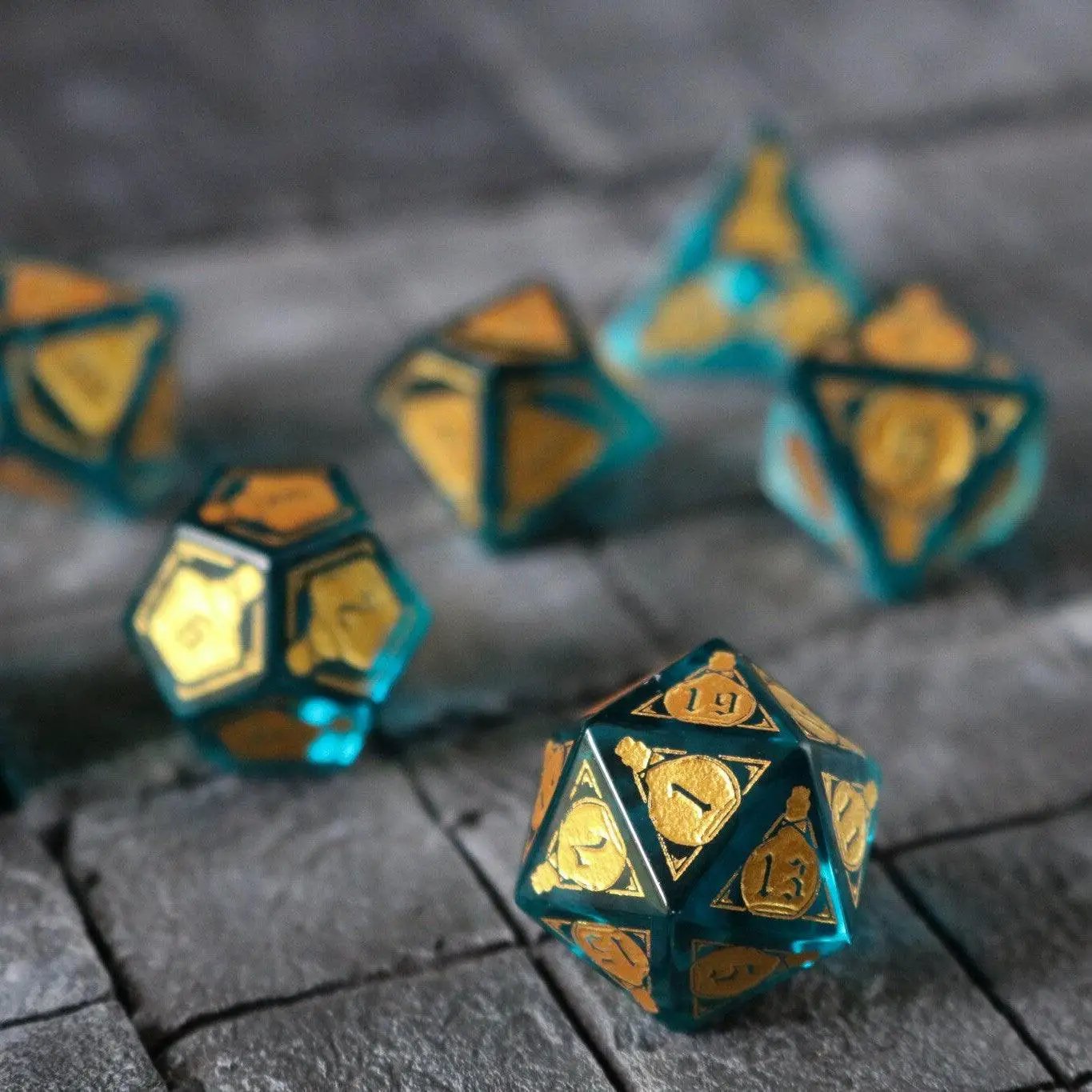 Blue zircon gemstone DND dice set by Runic Dice featuring mana potion-inspired design and clear glass material.