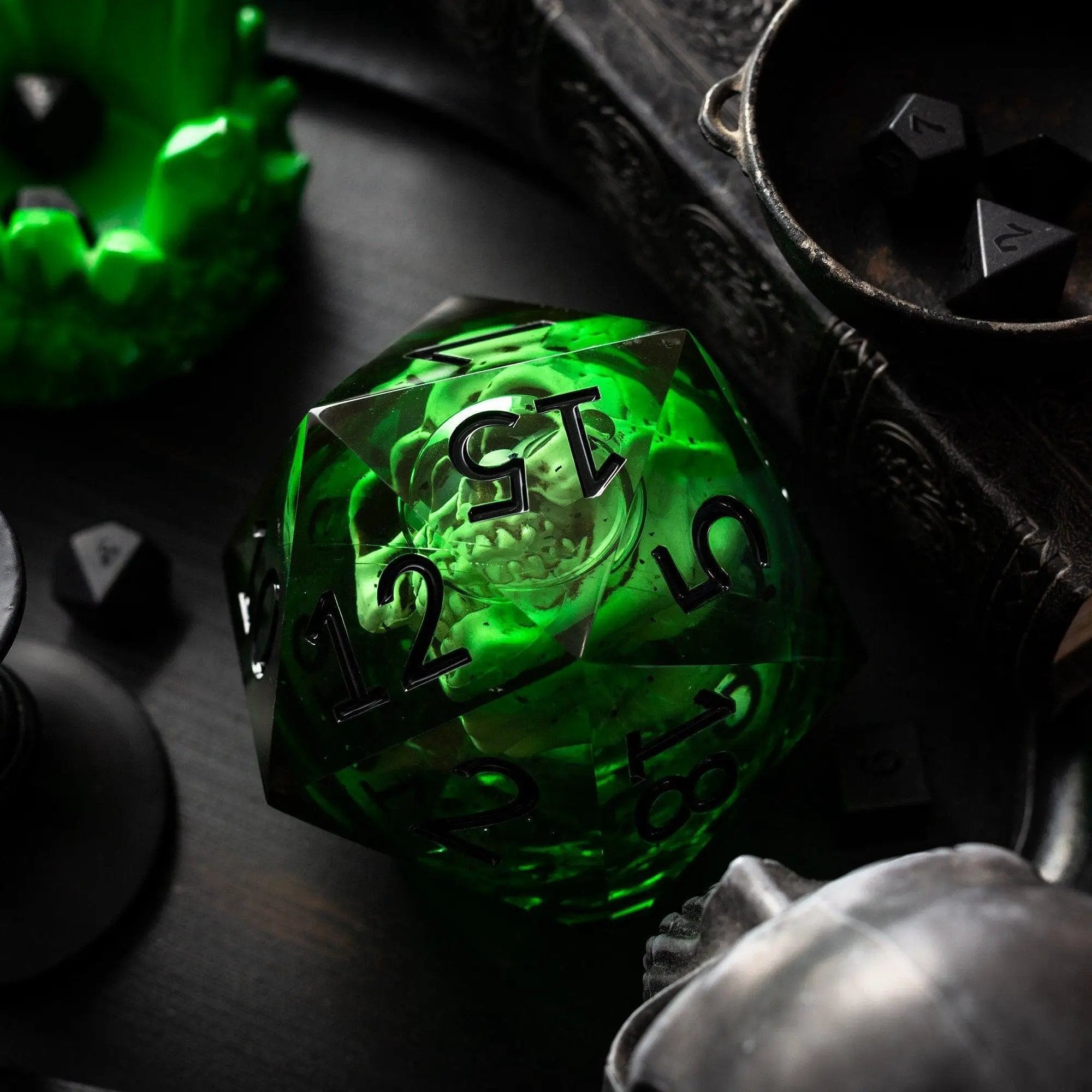 Large green skull liquid-core resin dice with chonk style, handmade by Runic Dice, displayed alongside its box.