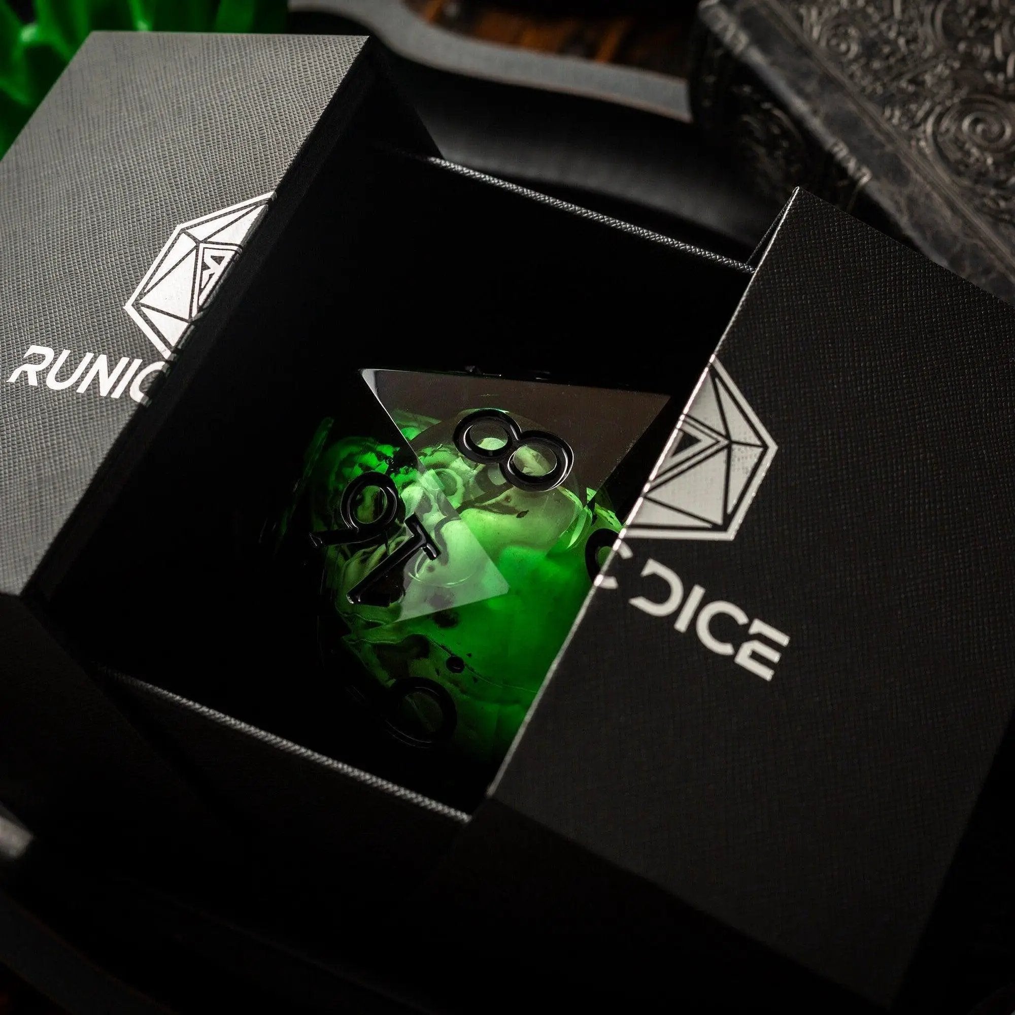 Runic Dice green resin chonk dice featuring a skull liquid core and matching box, 95mm handmade resin dice for gaming or collection.