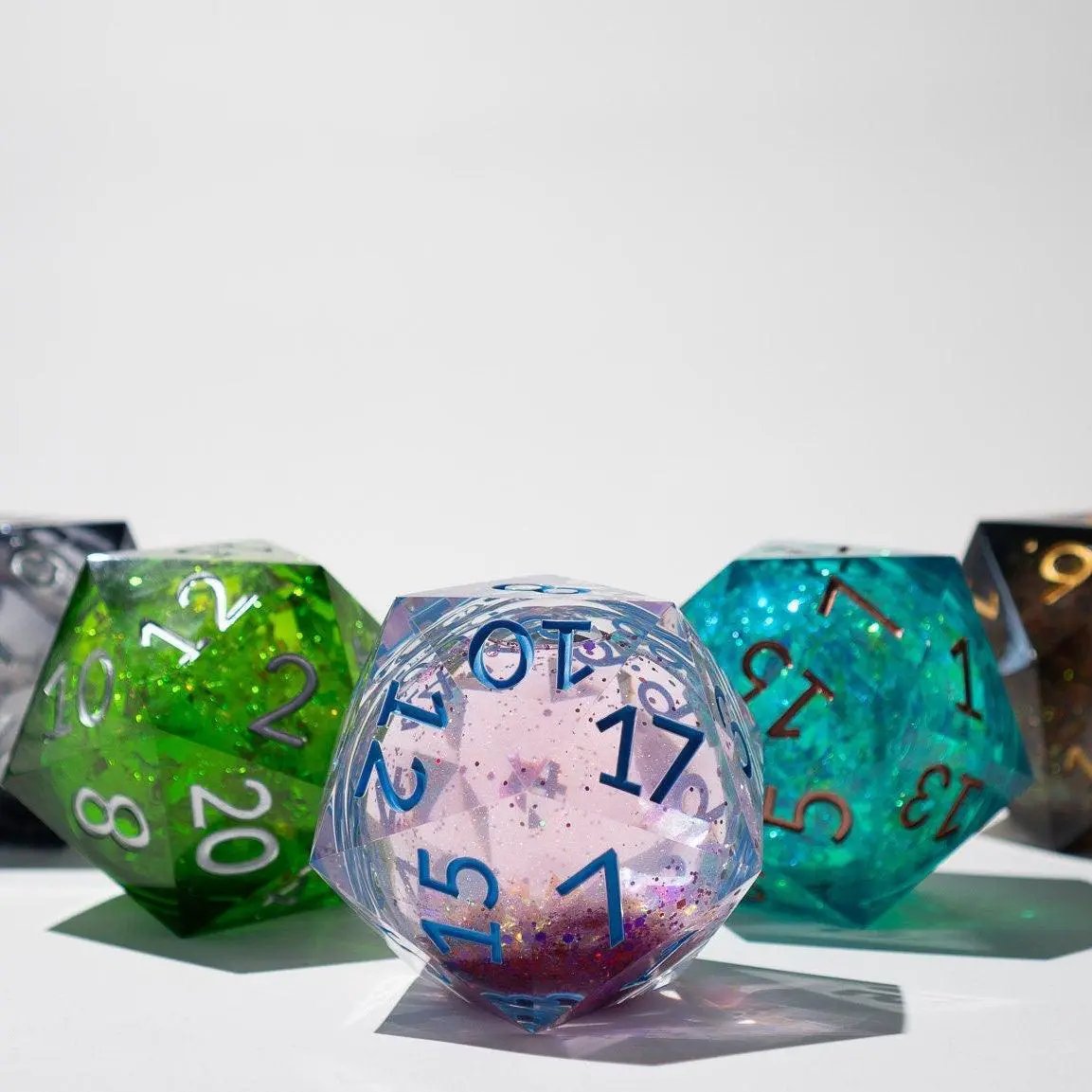 Sea green teal resin chonk dice with liquid core and matching box, handmade by Runic Dice, 95mm size.