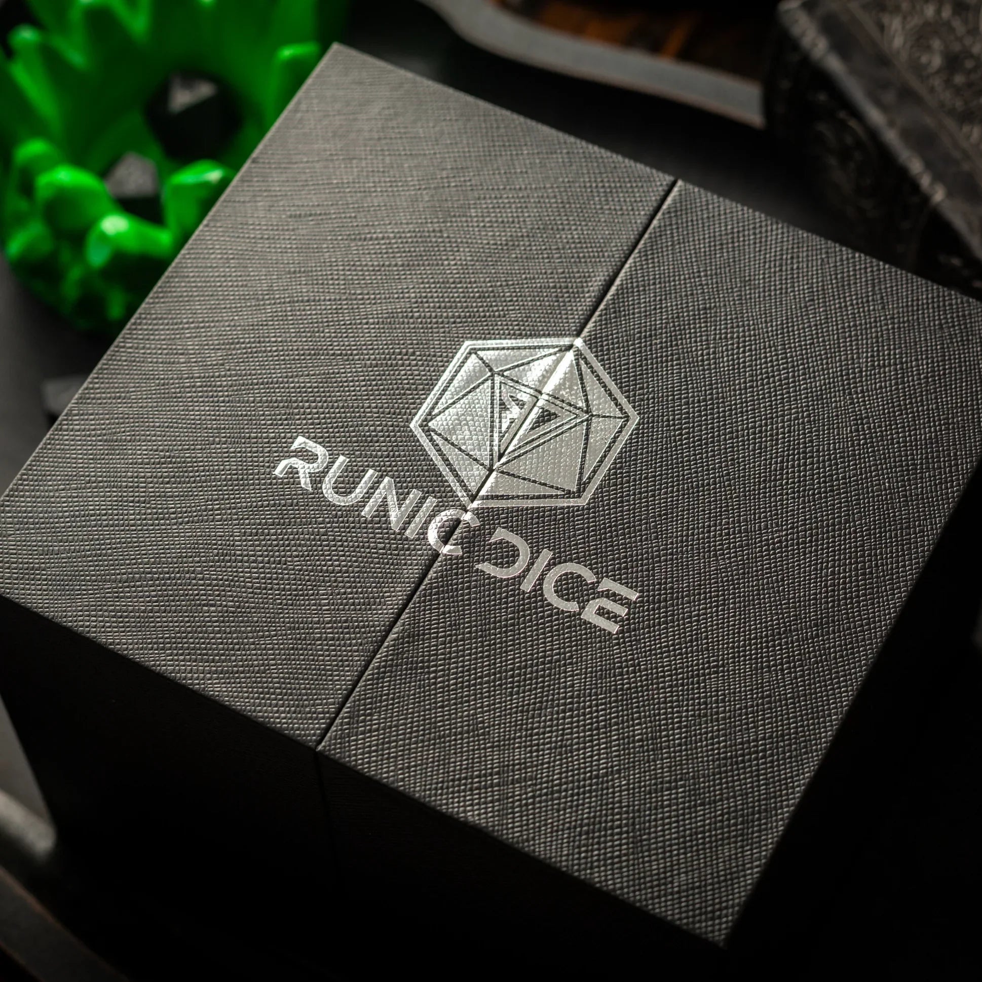Large sea green teal resin chonk dice with liquid core, handcrafted by Runic Dice, displayed alongside its matching box.