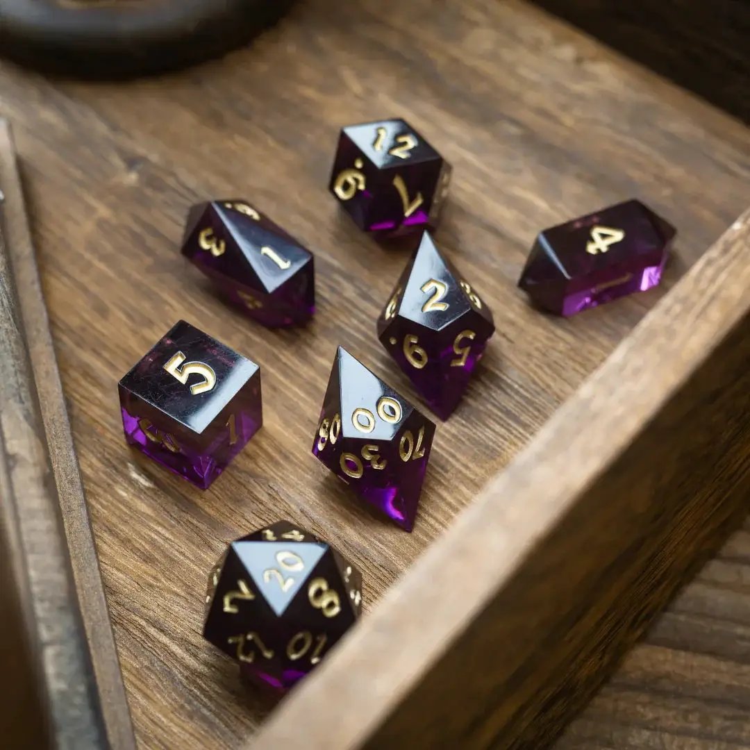 Mystic violet resin DND dice set by Runic Dice, featuring intricately designed polyhedral dice for tabletop gaming.