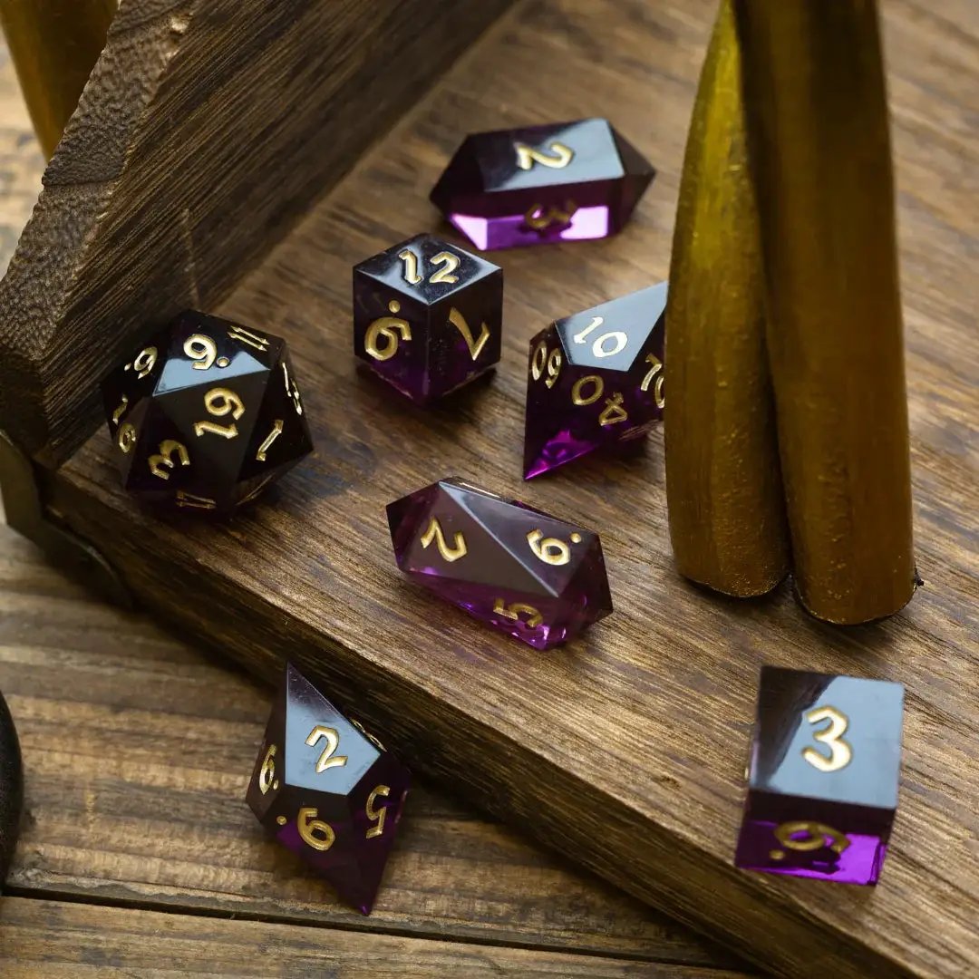 Mystic violet resin DND dice set by Runic Dice, featuring five intricately designed polyhedral dice for tabletop gaming.