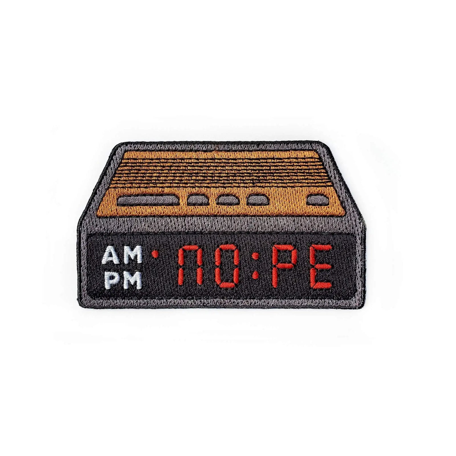 Kolorspun Nope Alarm Clock Patch, iron-on fabric patch featuring a cartoon alarm clock design for clothing or accessories.