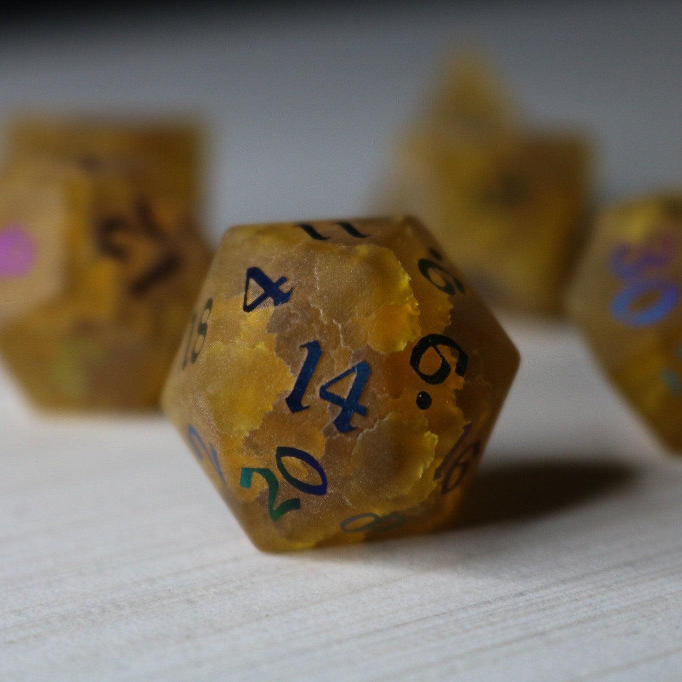 Orange Halloween pumpkin inked lightning cracked glass gemstone D&D dice set by Runic Dice, featuring vibrant, spooky design.