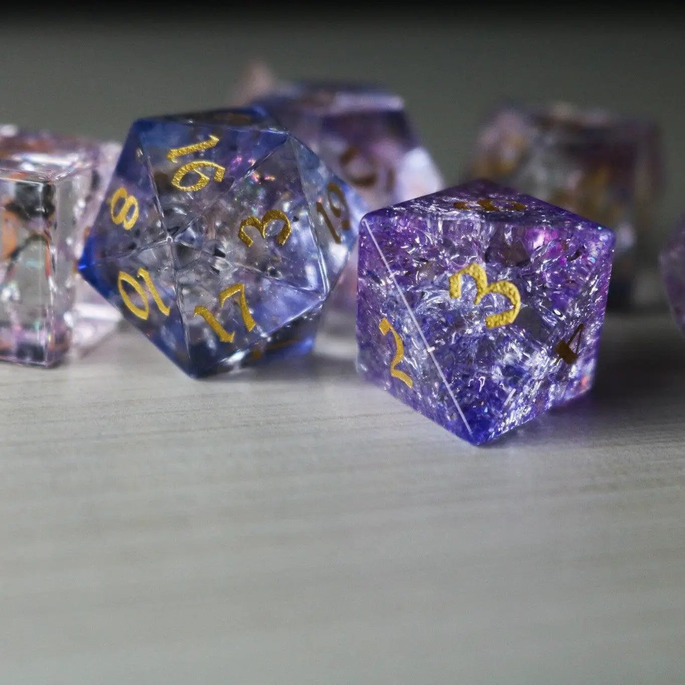 Purple gemstone DND dice set by Runic Dice featuring cloud and forge fire glass design for tabletop gaming.
