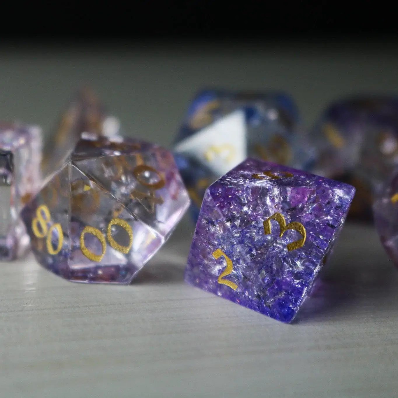 Purple gemstone DND dice set by Runic Dice featuring cloud forge fire glass design for tabletop role-playing games.