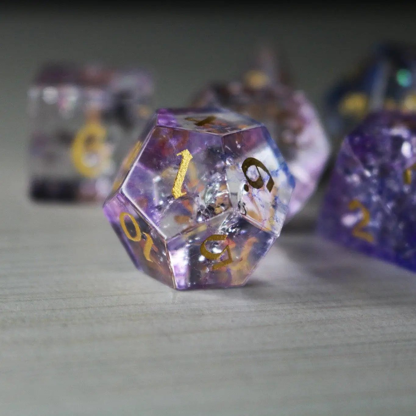 Purple gemstone DND dice set by Runic Dice featuring cloud and forge fire glass design for tabletop gaming.