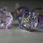 Purple gemstone DND dice set with fire glass design from Runic Dice, featuring purple cloud and forge-inspired details.