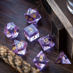 Purple zircon glass gemstone dice set by Runic Dice featuring hand-carved D&D polyhedral dice for tabletop gaming.