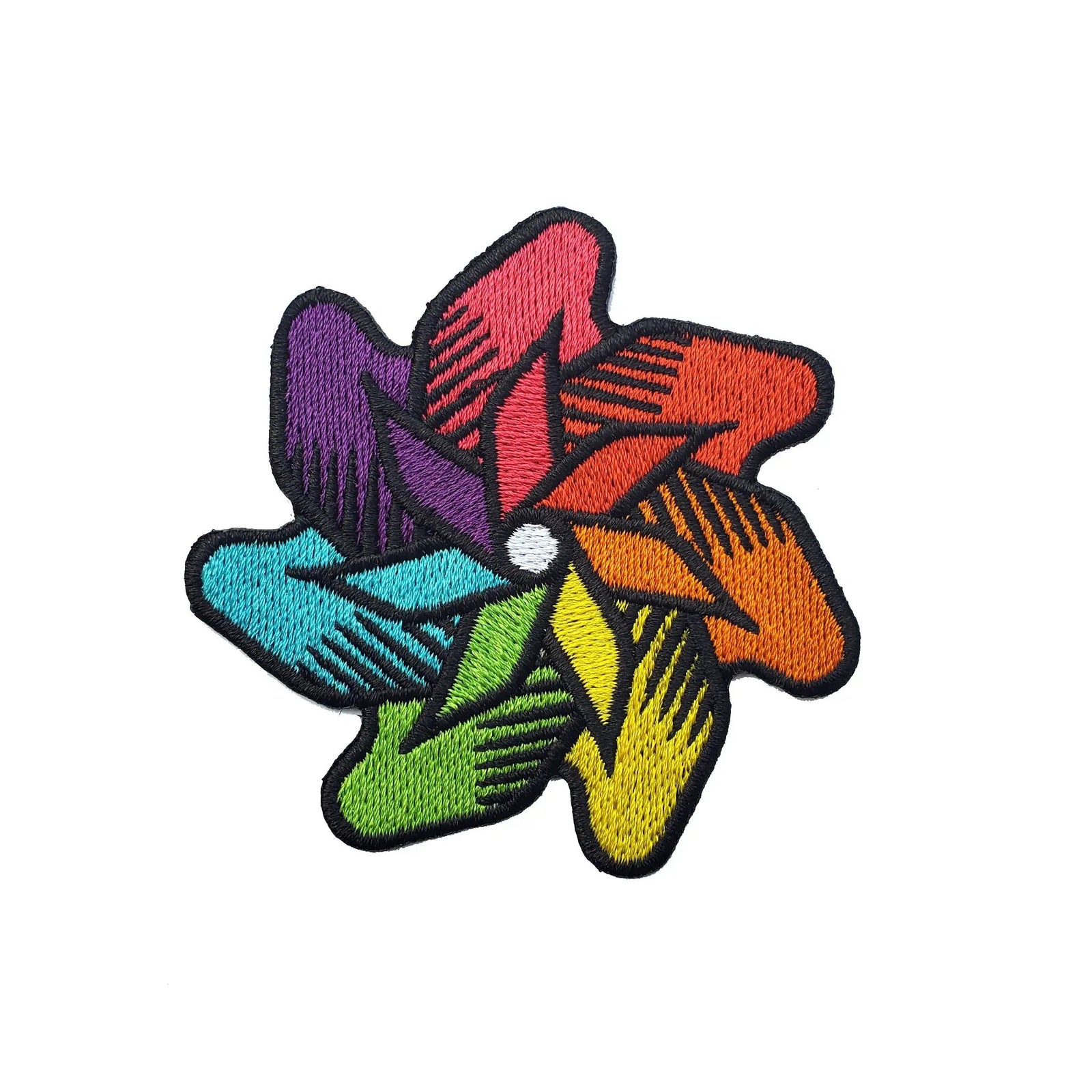 Colorful rainbow pinwheel iron-on patch by Kolorspun featuring vibrant, detailed design for clothing or accessories.