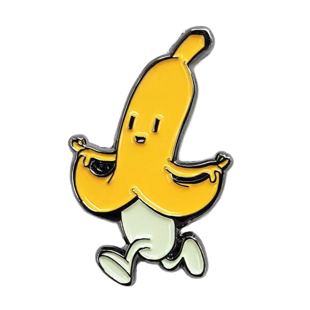 Black nickel Running Banana Pin by Kolorspun featuring a detailed cartoon banana design for casual wear or accessories.