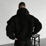 Oversized anime hoodie from Infinite Visibility featuring One Piece design, unisex fit, black fabric, and bold graphic print.