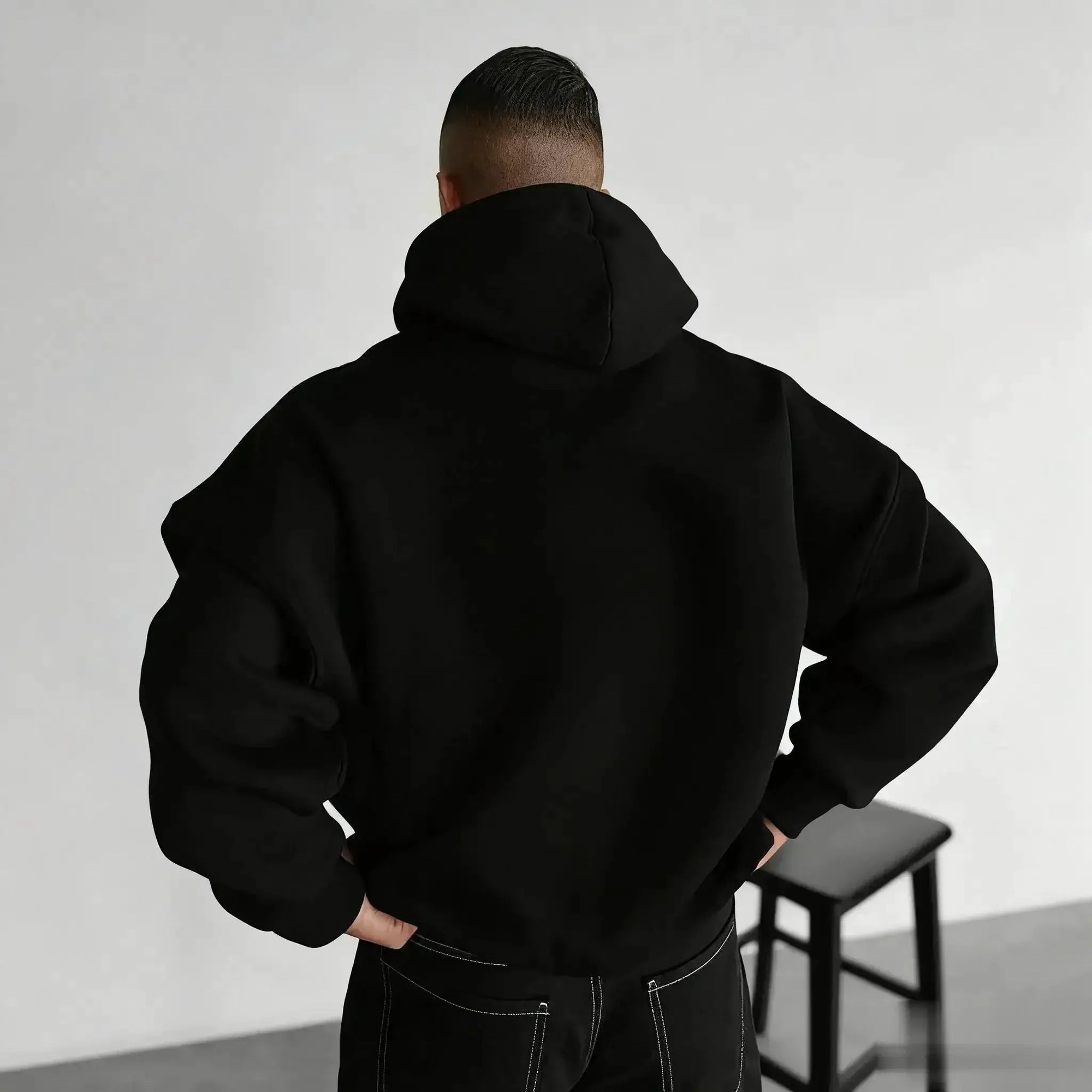 Oversized anime hoodie from Infinite Visibility featuring One Piece design, unisex fit, black fabric, and bold graphic print.