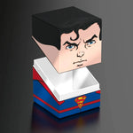 Dark gray Squaroe DC Justice League figure by The Mighty Hobby Shop featuring detailed design and iconic superhero elements.