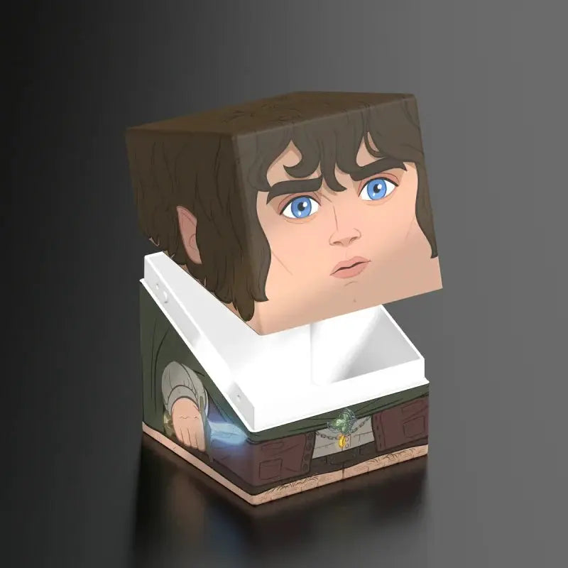 Dark-colored Frodo action figure from The Lord of the Rings, produced by The Mighty Hobby Shop, standing with detailed costume and accessories.