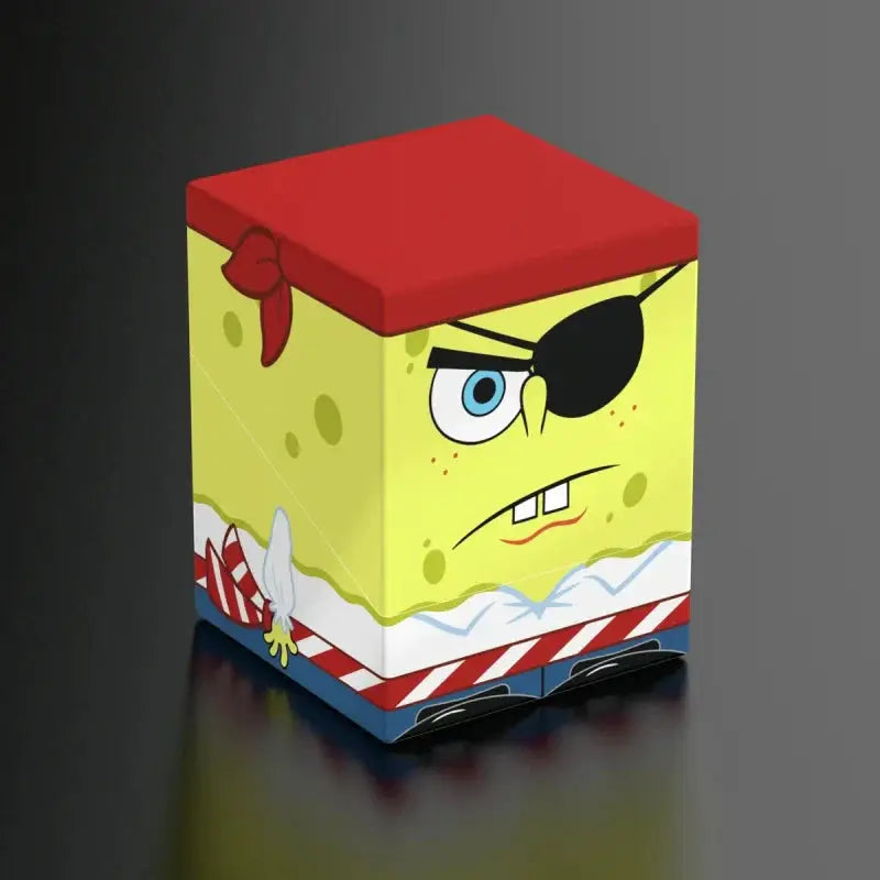 Dark-colored SpongeBob SquarePants plush toy from The Mighty Hobby Shop, featuring SpongeBob's signature square shape and cheerful face.