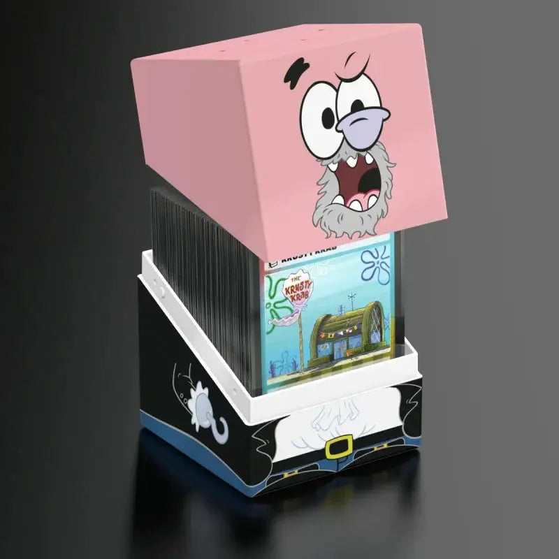 Dark-colored Squaroe SpongeBob SquarePants plush toy from The Mighty Hobby Shop, showing SpongeBob's face and square body.