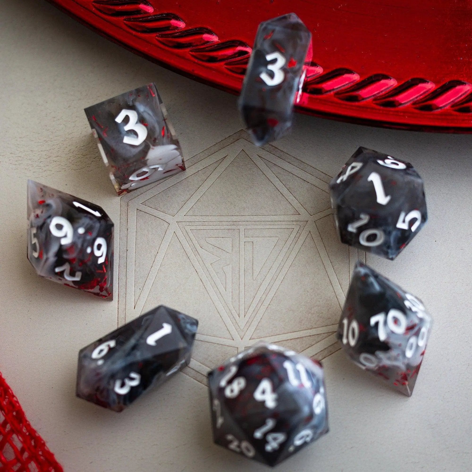 Smoke and Blood handmade resin DND dice set by Runic Dice featuring six intricately designed fantasy-style gaming dice.