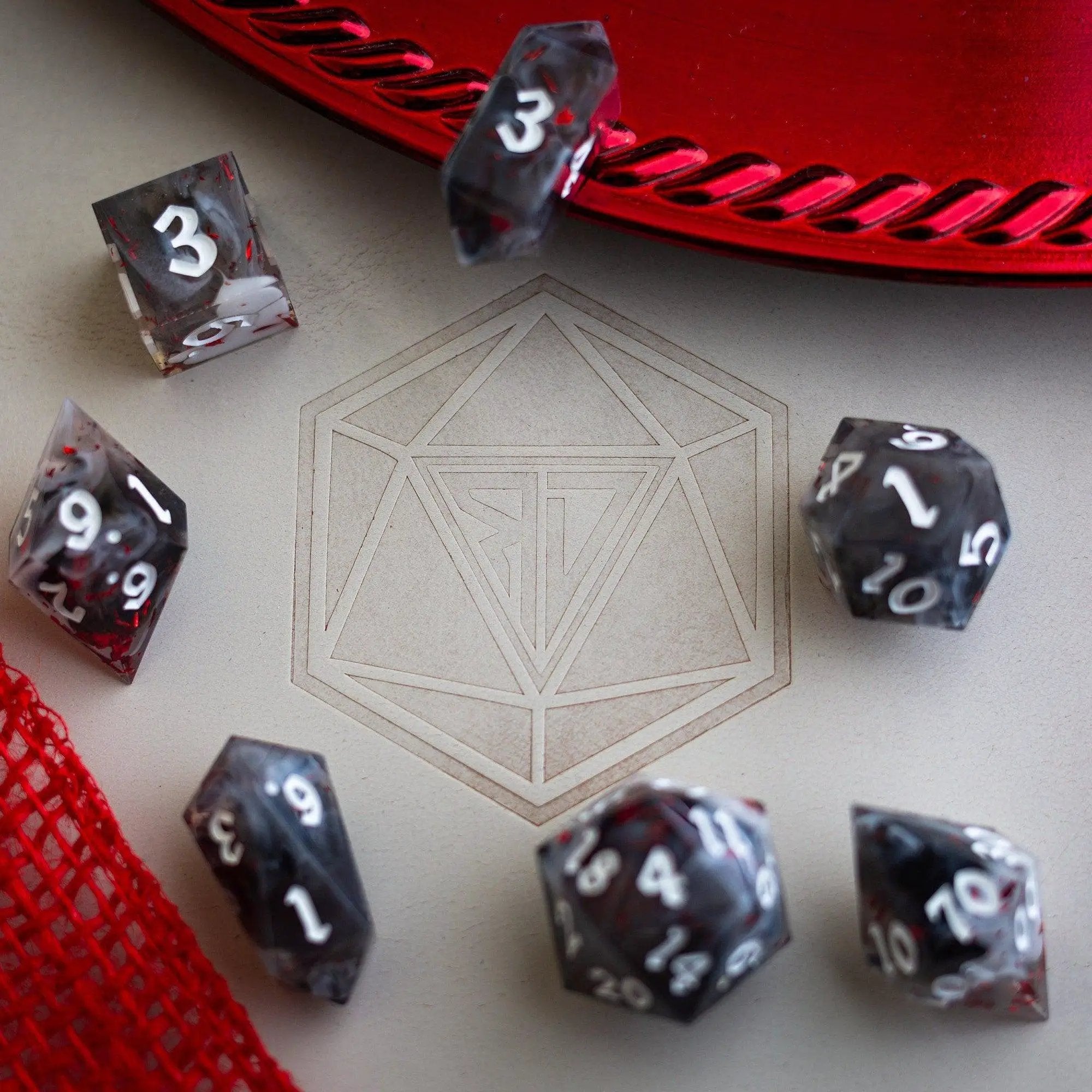 Smoke and Blood handmade resin DND dice set by Runic Dice, featuring dark smoky and blood-red colored polyhedral dice.