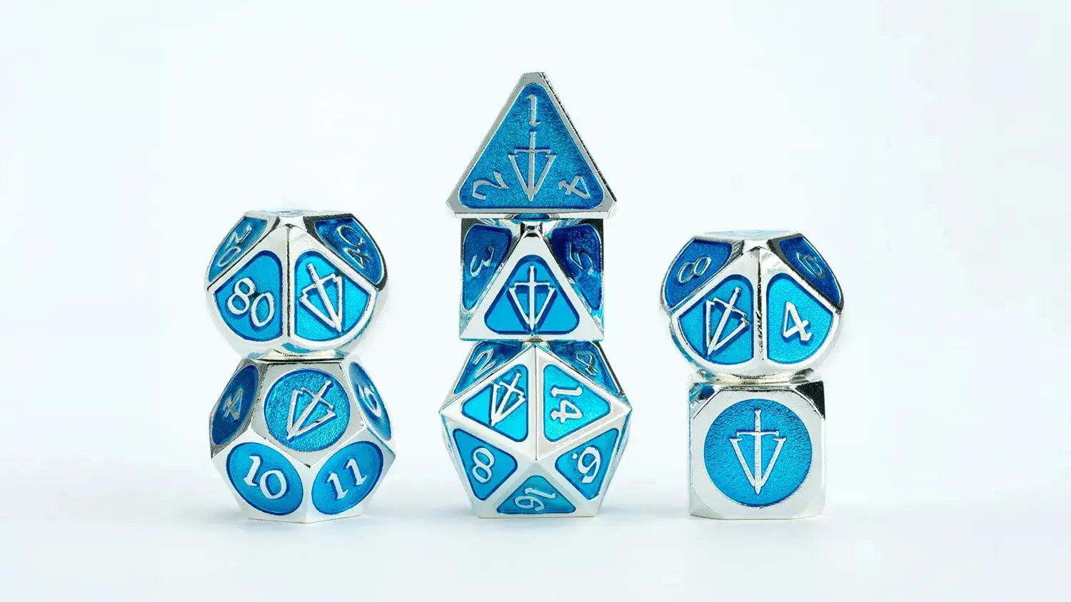 Silver metal dice set with light blue enamel accents from Tales of the Valiant by THE MIGHTY HOBBY SHOP.