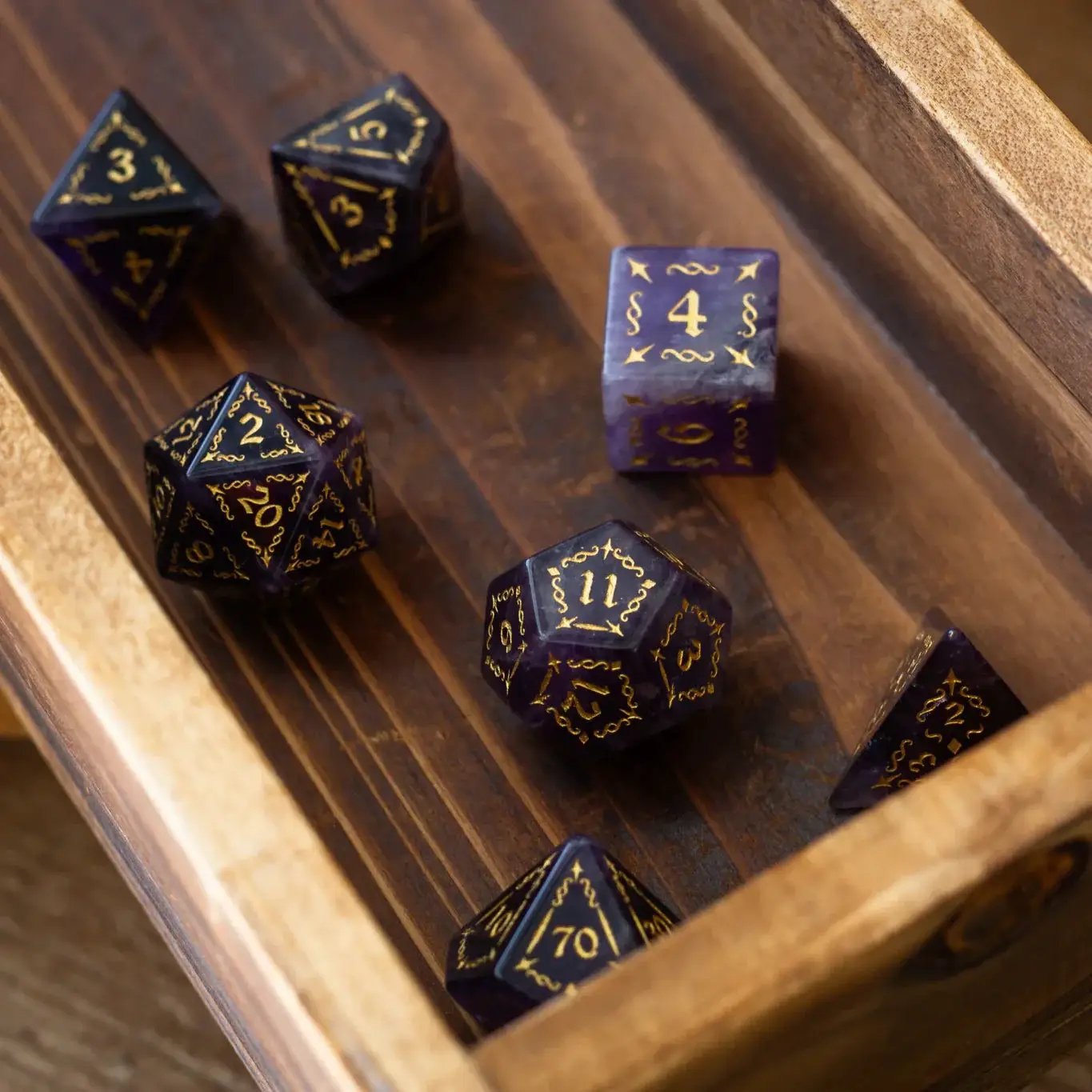 Vine spike purple amethyst gemstone DND dice set by Runic Dice featuring polished, vibrant purple gemstone dice for tabletop gaming.