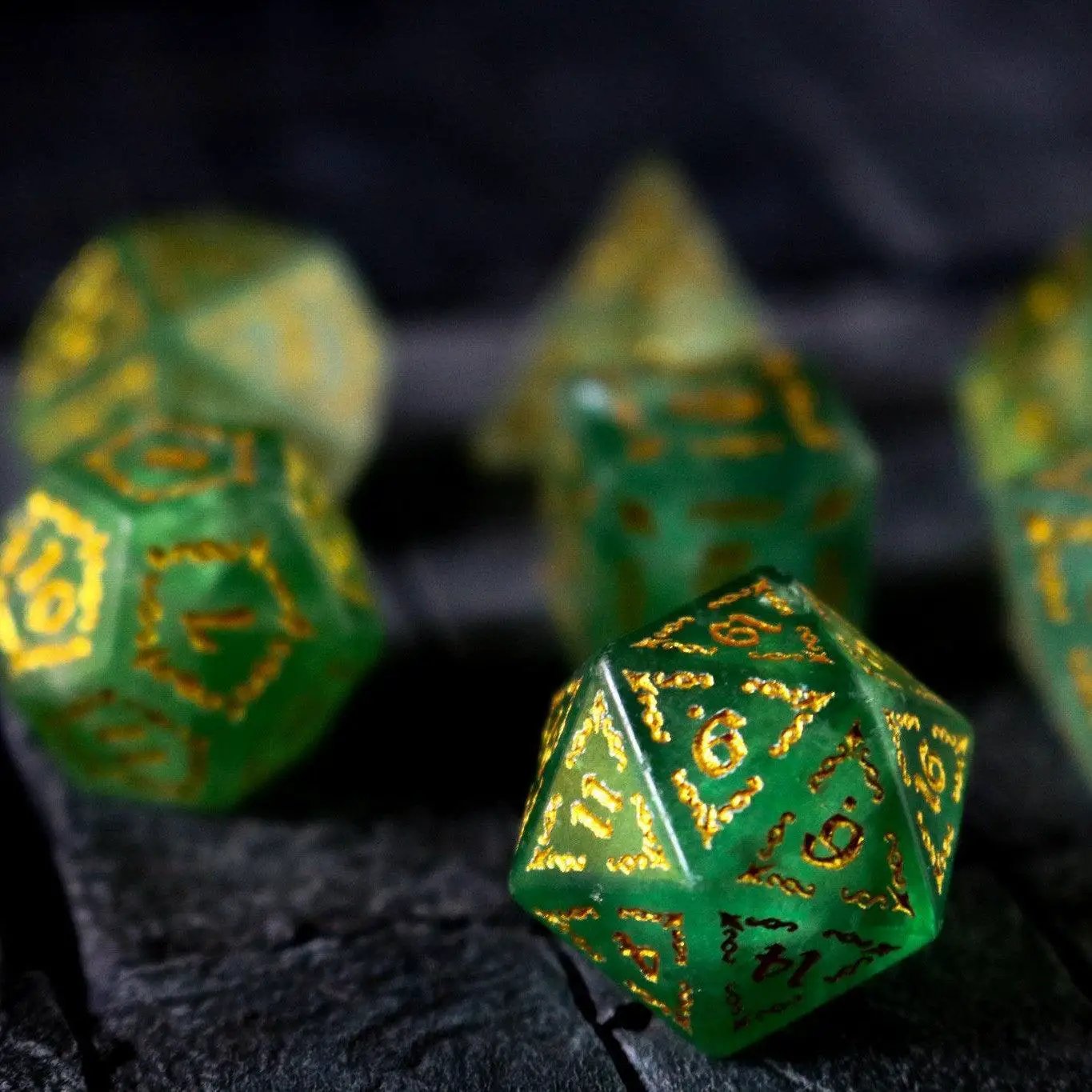 Vine spike green fluorite gemstone DND dice set by Runic Dice with intricately carved gemstone dice for tabletop gaming.