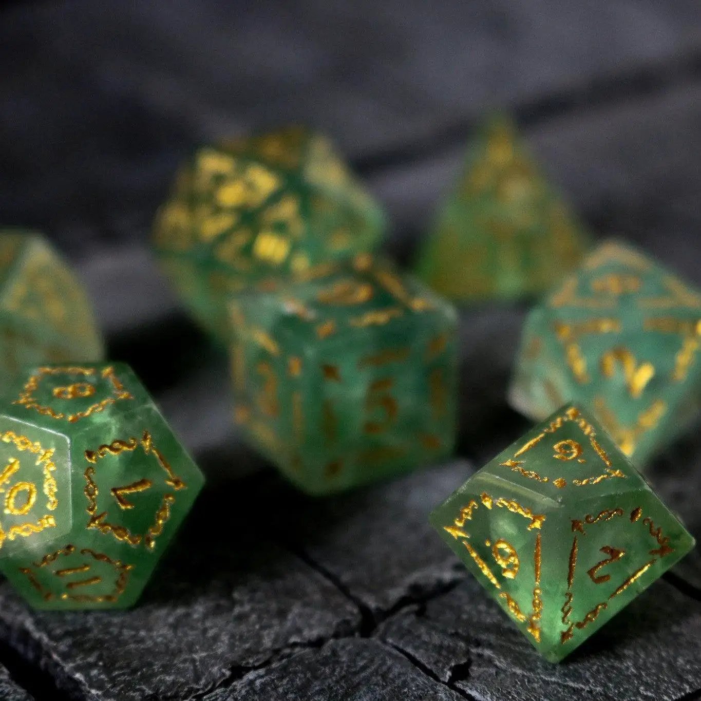 Vine Spike green fluorite gemstone DND dice set by Runic Dice, featuring vibrant, polished gemstone dice for tabletop gaming.