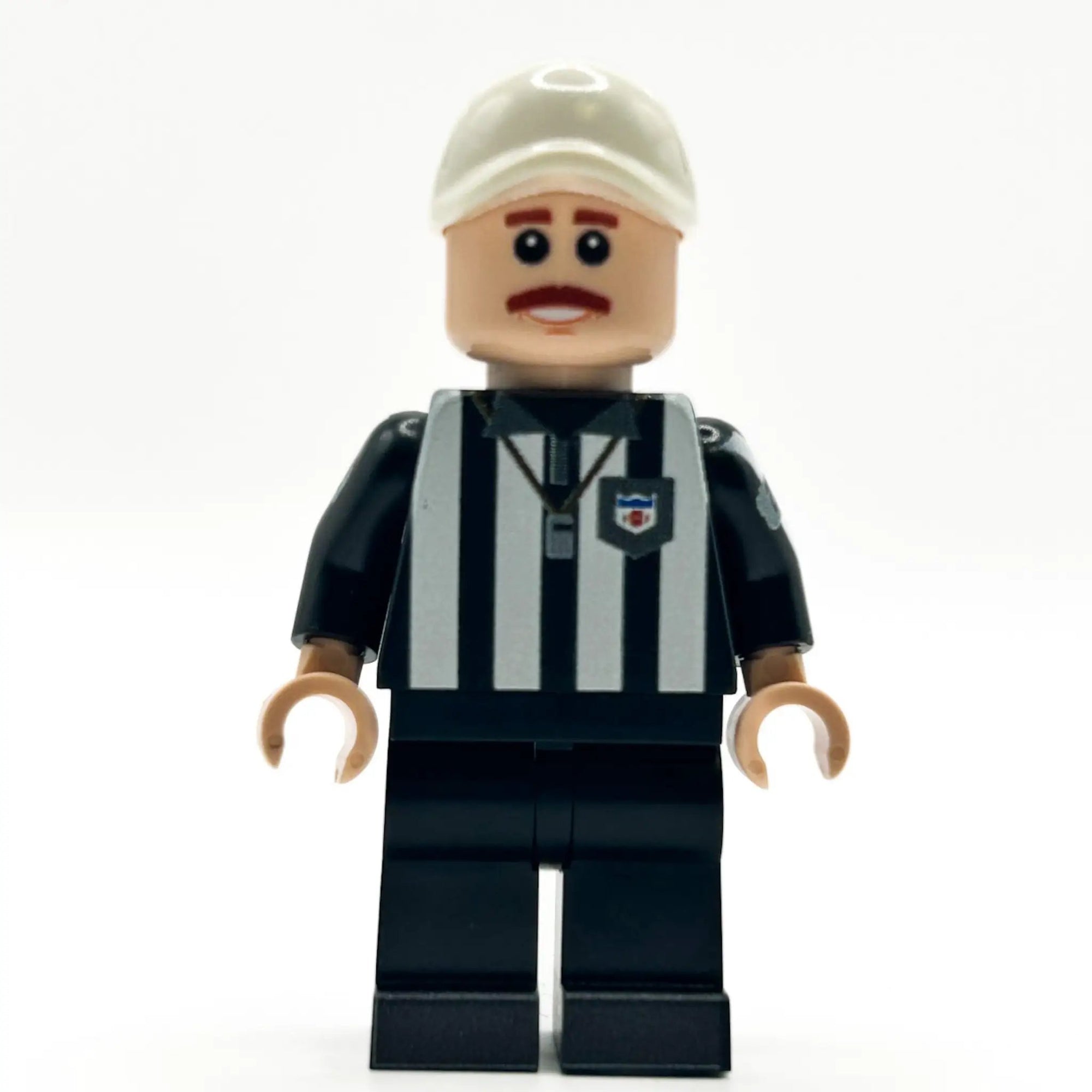Custom LEGO football referee minifigure by B3 Customs, featuring a referee uniform and accessories made with LEGO parts.