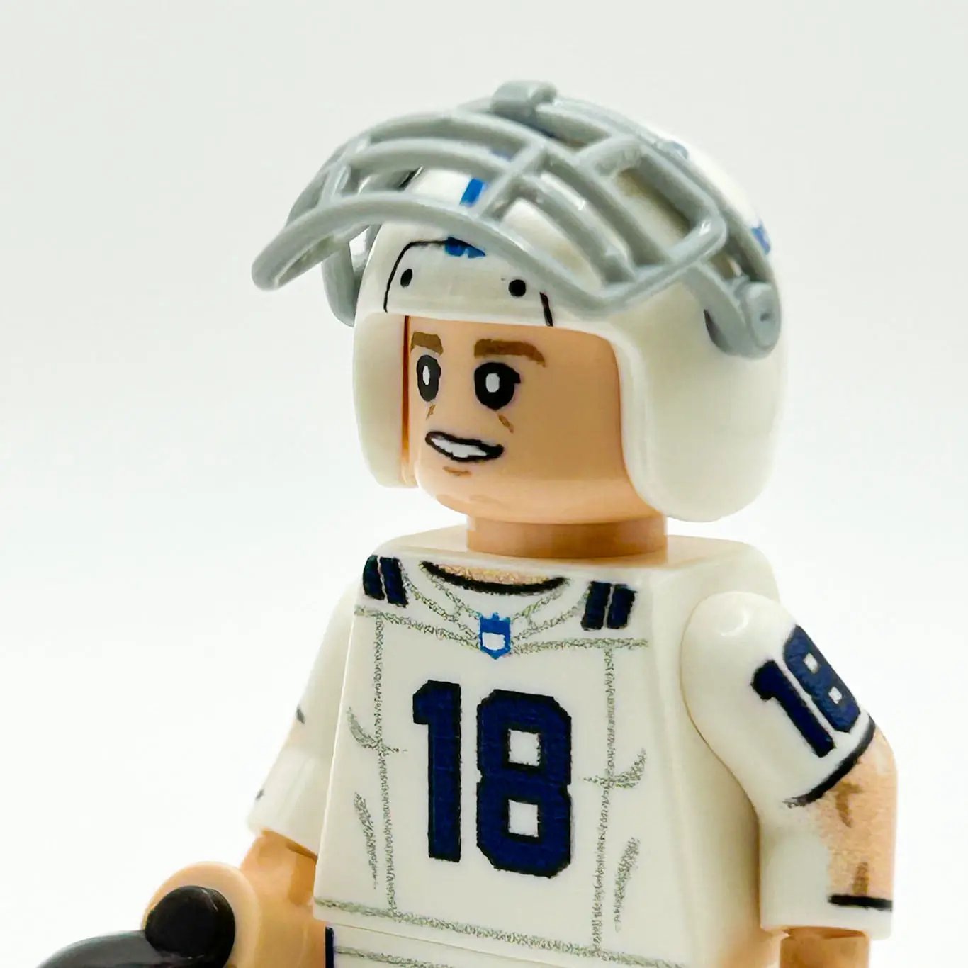 Custom LEGO QB Indy football player minifigure by B3 Customs, featuring detailed helmet, jersey, and football accessories.