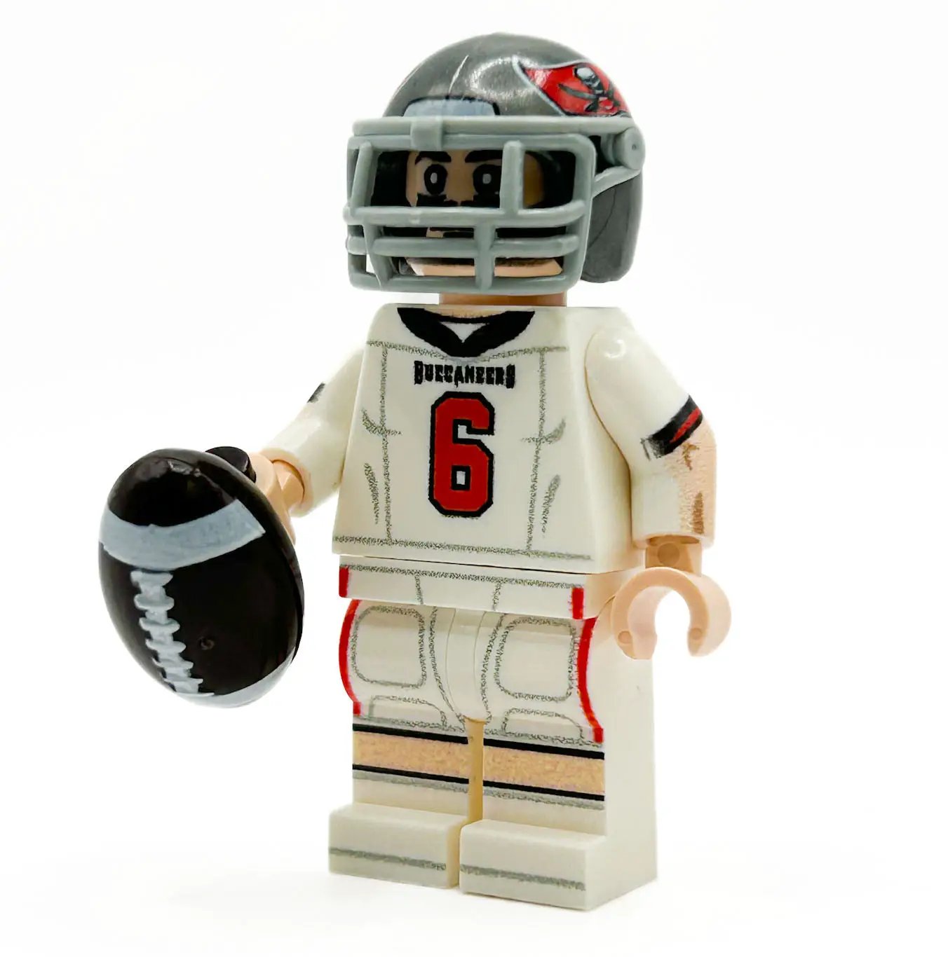 Custom LEGO minifigure of a Tampa Bay Buccaneers football player made by B3 Customs, featuring team jersey and helmet details.