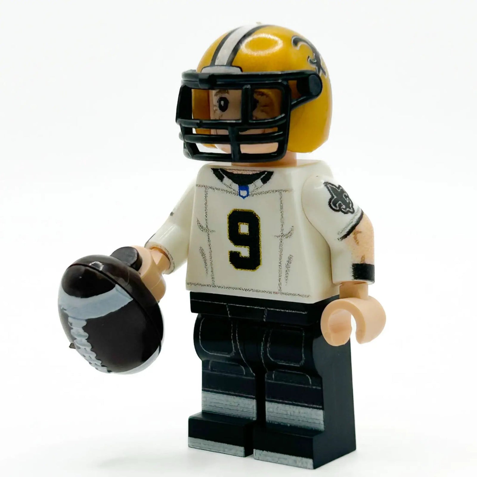 Custom LEGO Minifigure of New Orleans football player, made with B3 Customs LEGO parts, featuring team jersey and helmet details.