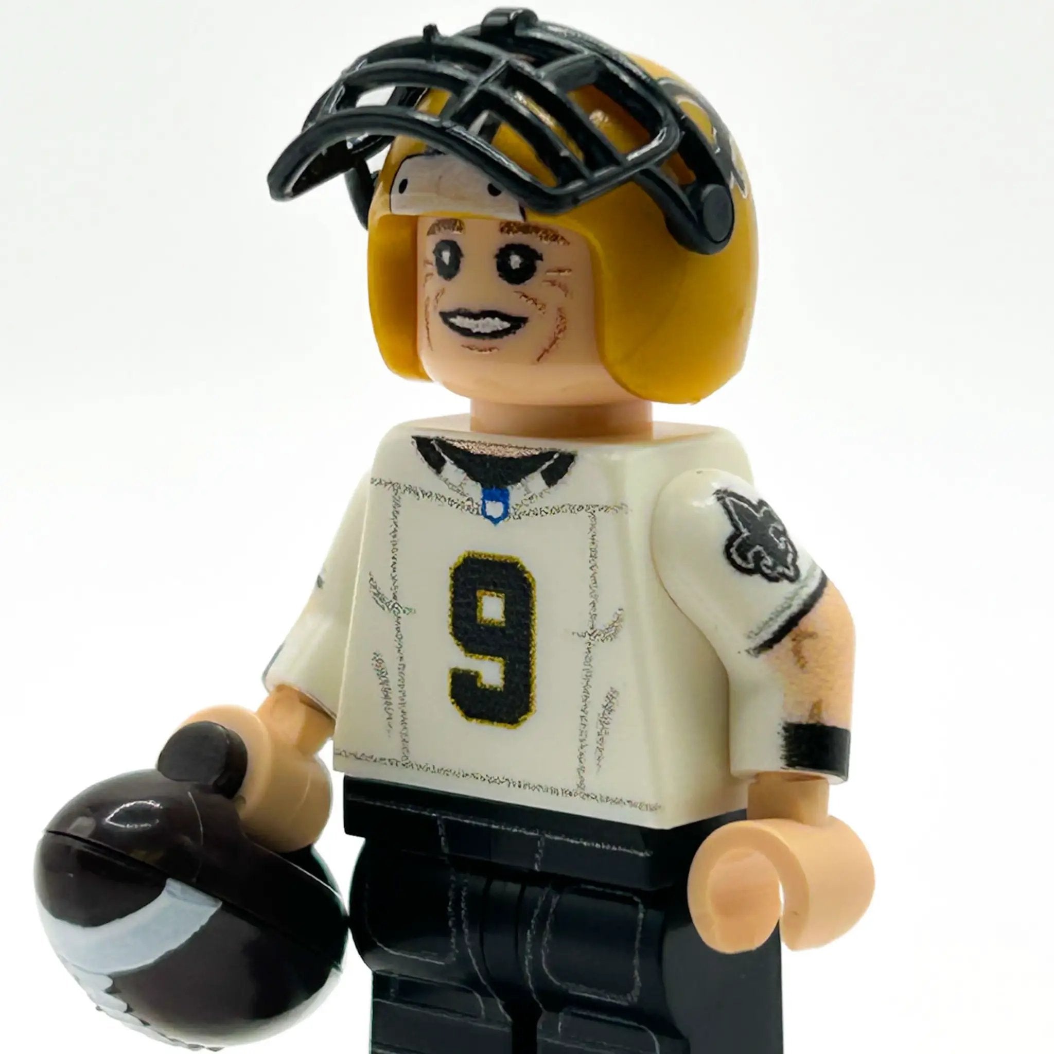 Custom LEGO minifigure of New Orleans football player number 9 by B3 Customs, detailed LEGO parts, sports-themed minifig.